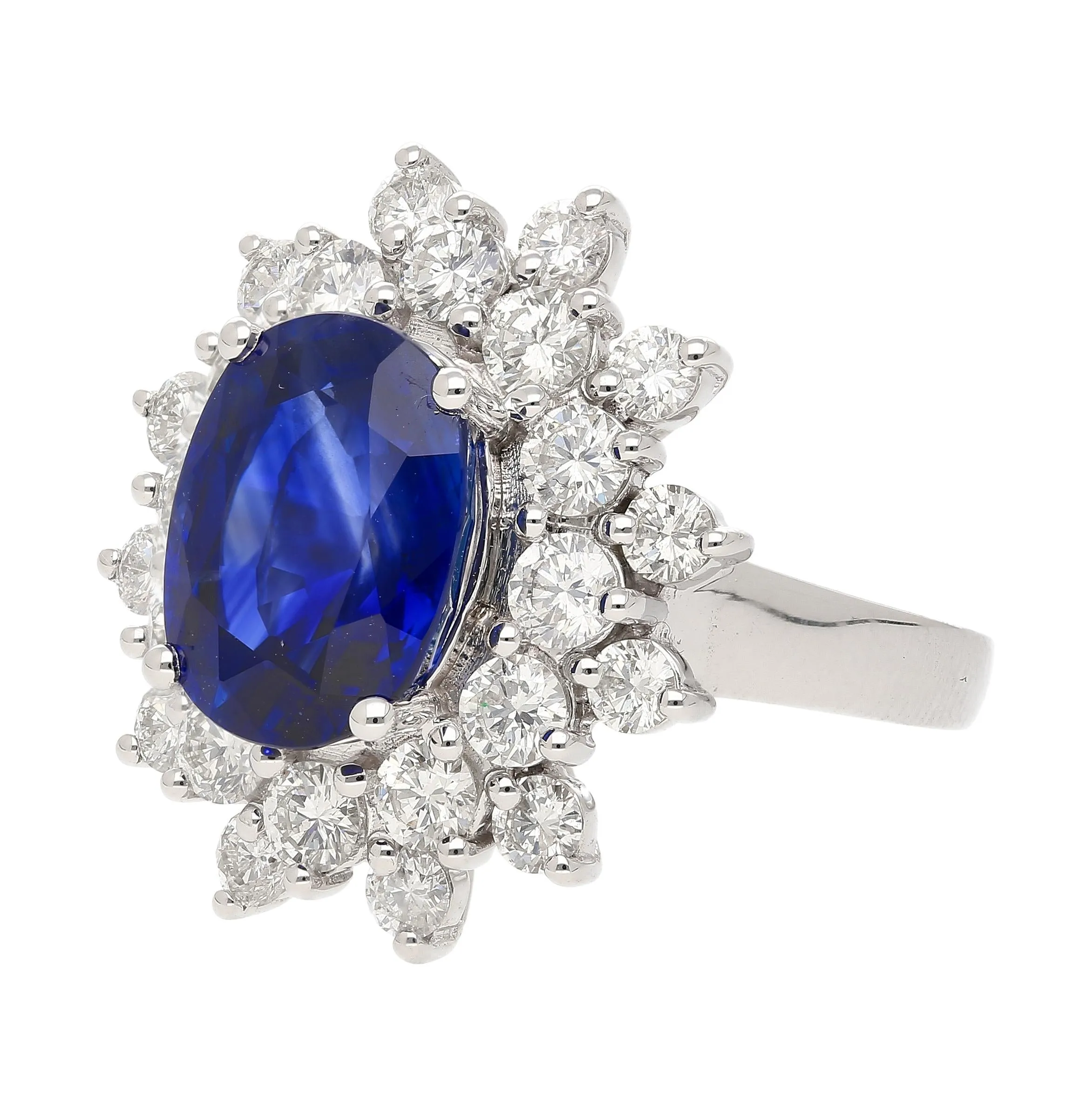 GRS Certified 5.79 Carat Oval Royal Blue Sapphire and Diamond Halo Ring